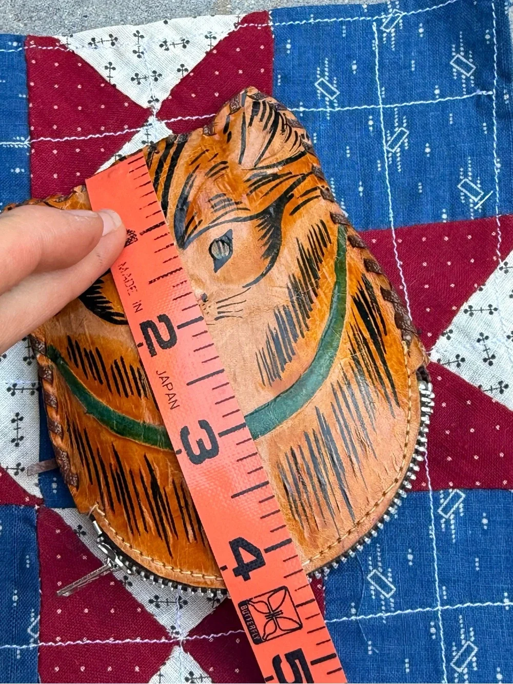 Vintage Brown Leather Cat Pouch with Green Collar Design